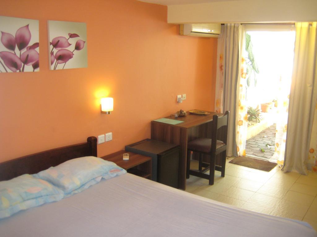 Le Cactus Guest House Baie-du-Tombeau Quarto foto