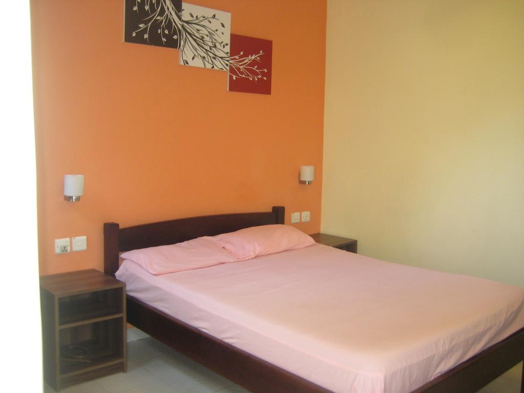 Le Cactus Guest House Baie-du-Tombeau Quarto foto