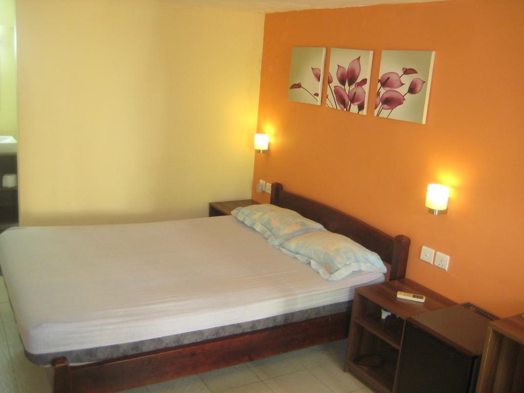 Le Cactus Guest House Baie-du-Tombeau Quarto foto